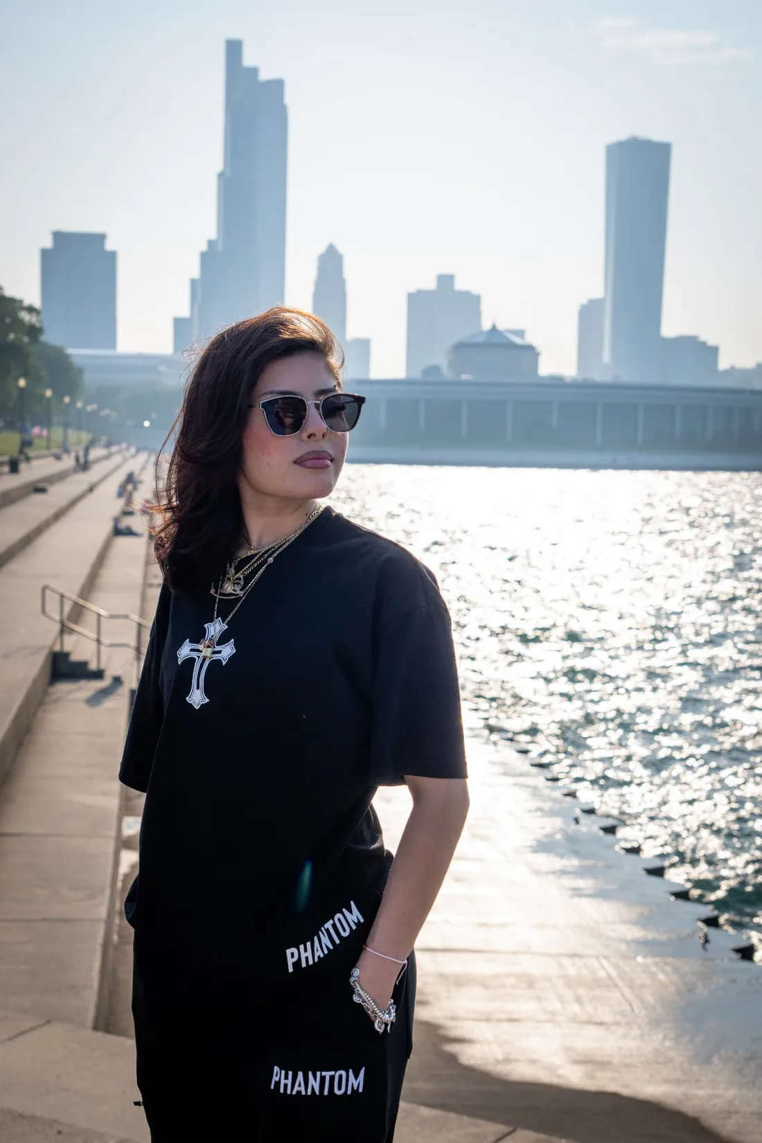 Black Blessed Cross oversized tee on the lakefront